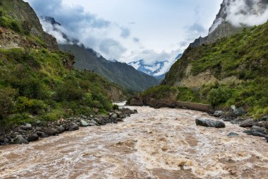 Crossing the Urubamba River in the beginning of the Inca Trail in the Sacred Valley clipart
