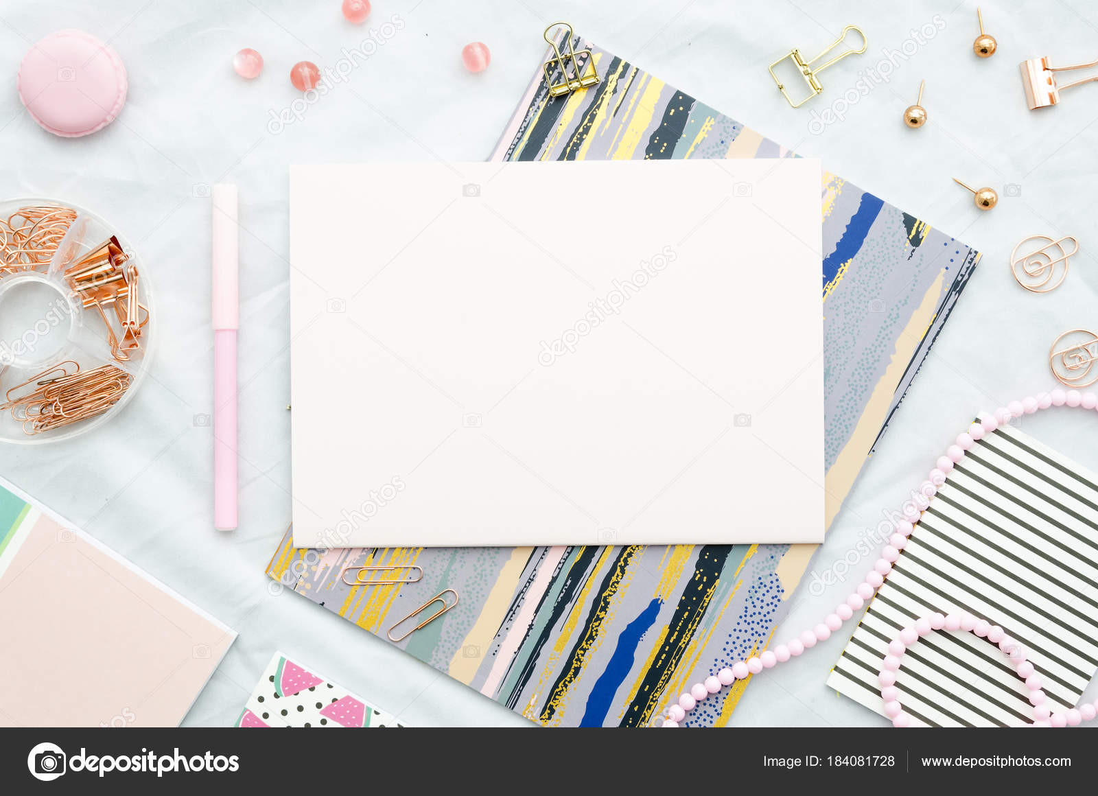 Flat lay with sketchbook, and office supplies on white background. Top view  mockup Stock Photo by ©woodpencil 184081728