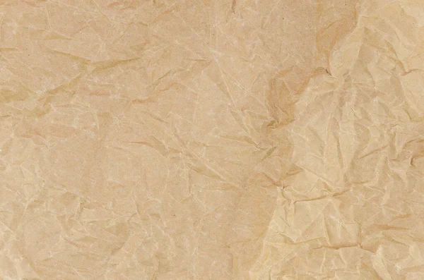 Platt låg skrynklig brun hantverk papper bakgrund konsistens — Stockfoto