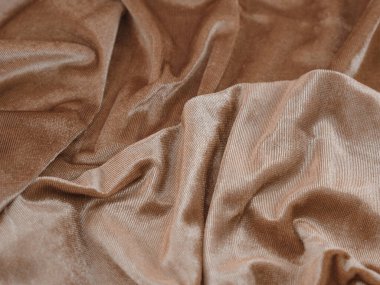 Gül sarısı buruşuk kumaş dokusu. Kırışık tekstil arkaplanı