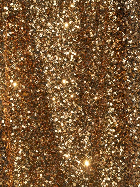 Close up gold Sequins Fashion cloth vertical pattern