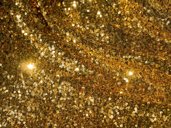 Top view gouden glitter achtergrond, glanzende reliëf textuur — Stockfoto