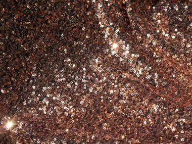 Cazibeli altın pullu kumaş. Tatil arkaplanı için.