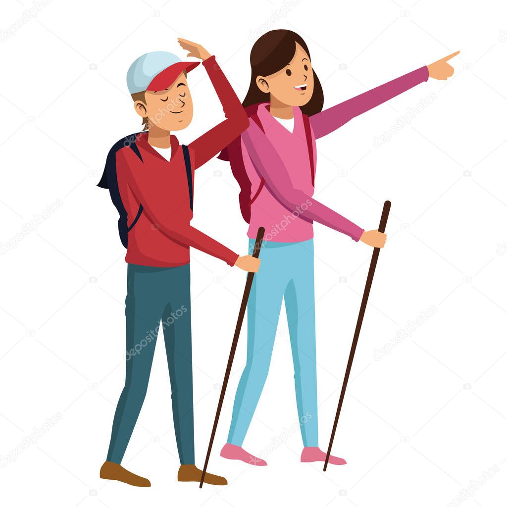 young couple hiking with backpack walking sticks