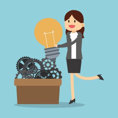 İş kadını ampul ve dişli kutusu