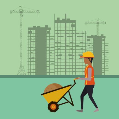 İnşaat alanında çalışan bir inşaatçı.