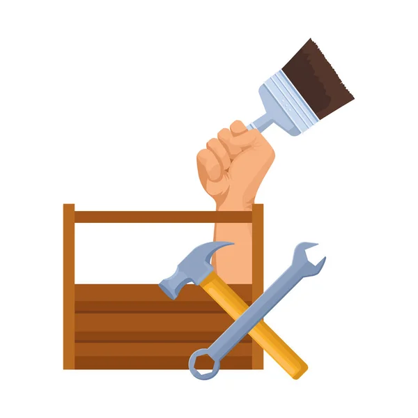 Hand holding a paint brush and wooden box and tools — Stock Vector