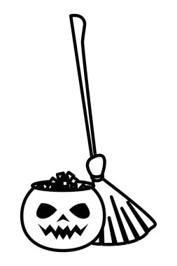 Tatlı şeker ve cadı süpürgesiyle Cadılar Bayramı balkabağı