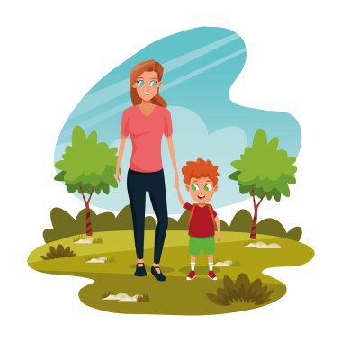 Parkta oğluyla mutlu bir anne.