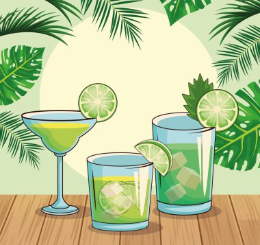 green cocktails over tropical leaves and retro style background