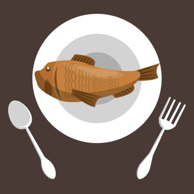 dish and cutleries with fish