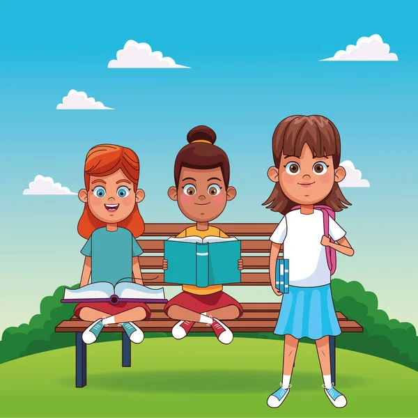 Desenhos animados meninas felizes com livro sentado em um banco e menina de pé — Vetor de Stock