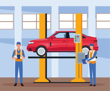 Araba tamircilerinin kaldırdığı araba tamirhanesi manzarası