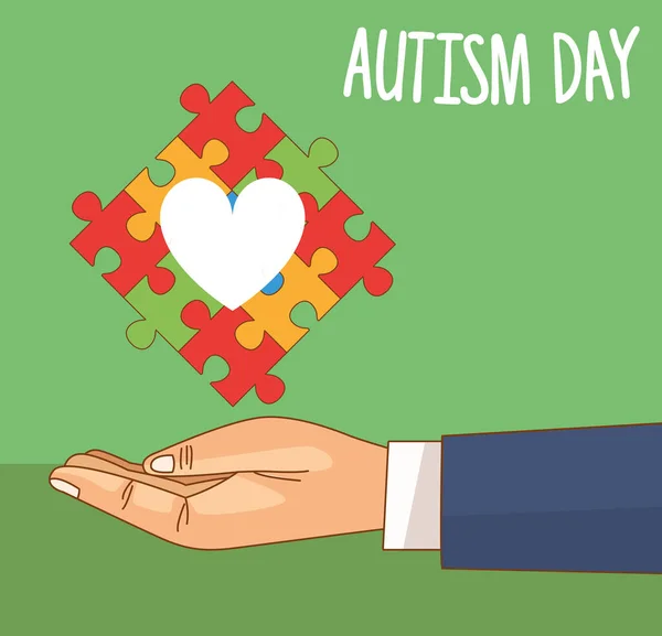 Día mundial del autismo con piezas del rompecabezas de elevación de la mano — Archivo Imágenes Vectoriales