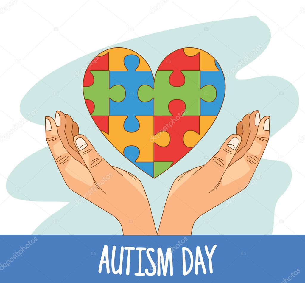 world autism day with hands and puzzle game pieces