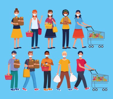 İnsanlar süpermarkette yüz maskesi takıp alışveriş yapıyorlar.