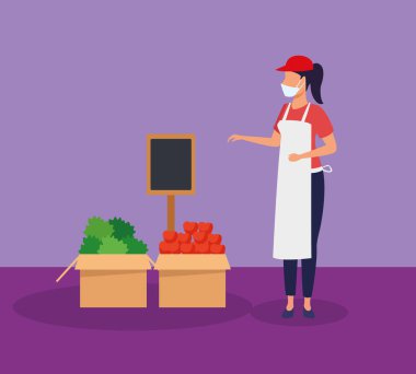Yüzü maskeli süpermarket kadın çalışanı