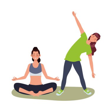 Genç kız sporcular egzersiz yapıyor.