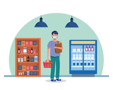 Süpermarkette maske takan bir adam.