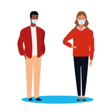 Kovid19 için yüz maskesi kullanan ırklar arası bir çift.