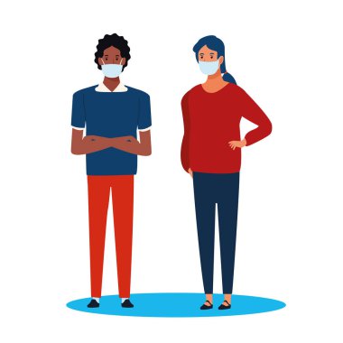 Kovid19 için yüz maskesi kullanan ırklar arası bir çift.