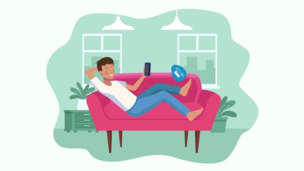 Ficar em casa campanha com o homem assistindo tv no sofá — Vídeo de Stock