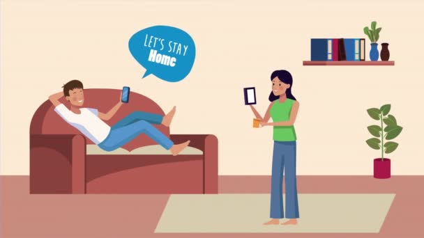 Maradjon otthon kampány pár a nappaliban — Stock videók