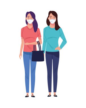 Tıbbi maske takan genç kadınlar