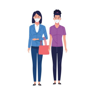 Tıbbi maske takan genç kadınlar