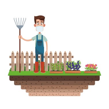 Tıbbi maske takan erkek çiftçi