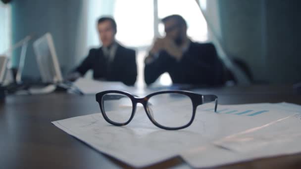 Two Business People Working Together New Project Glasses Papers Foreground — Stock Video