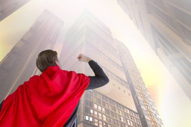 Cape süper kahraman ile bir takım elbise giymiş işadamı 