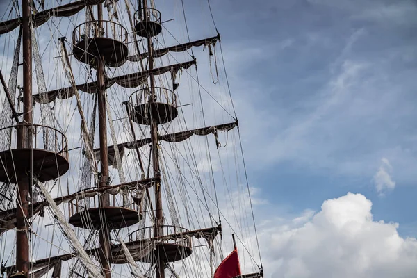 mast of an ancient sailing pirate ship closeup