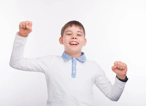 하얀 배경 위에서 웃고 축하하는 어린 소년 — 스톡 사진