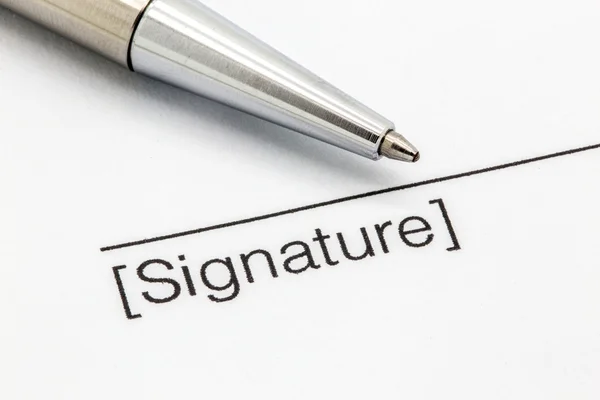 Signature contract with a silver pen
