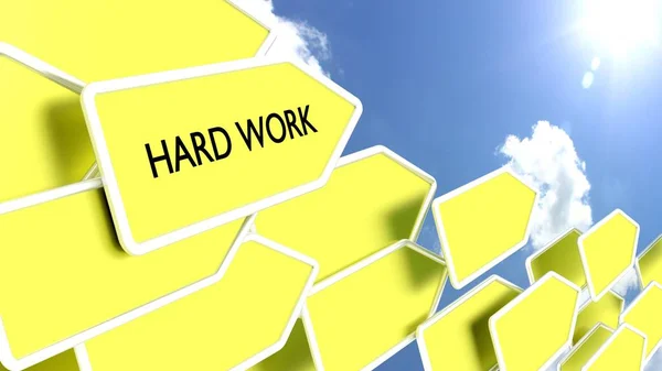 Panah kuning dengan kata-kata kerja keras — Stok Foto