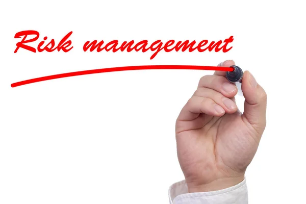 Mão sublinhando a gestão do risco de trabalho em vermelho — Fotografia de Stock