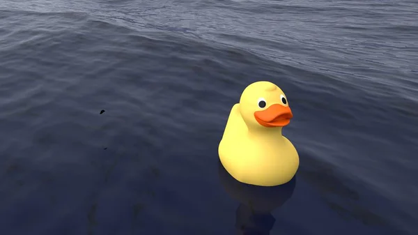 Lonely yellow rubber duck swimming on the ocean — Stock Photo, Image