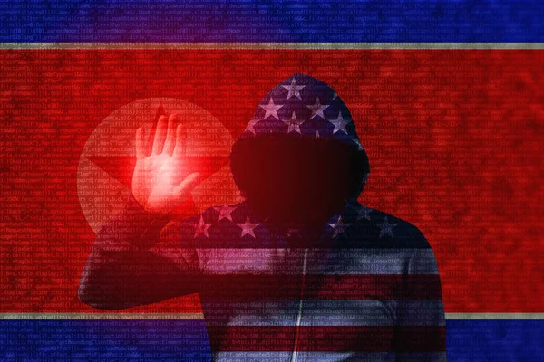 Американський хакер, торкаючись північнокорейських прапор — стокове фото