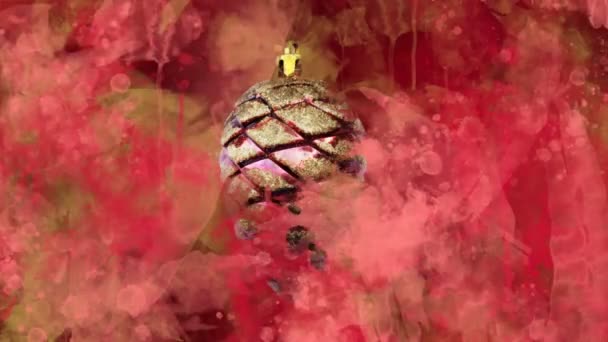 분홍빛 크리스마스 장식에 붉은 색색 얼룩 이 있는 땅 위에 있는 붉은 원뿔. — 비디오