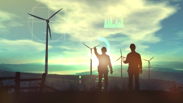 Silhouettes of engineers against the backdrop of the sunset and wind farms. — 비디오