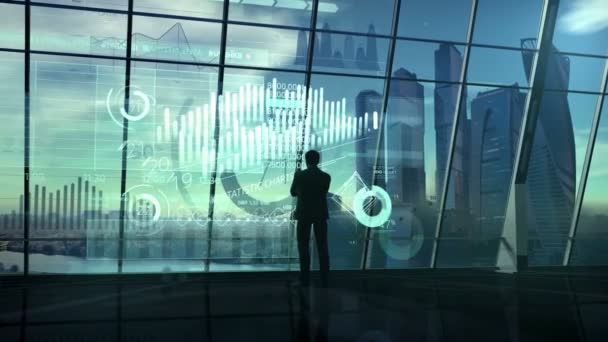 Silhouette of a businessman surrounded by an array of data. — Stockvideo