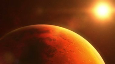 The planet Mars is brightly lit by the sun.