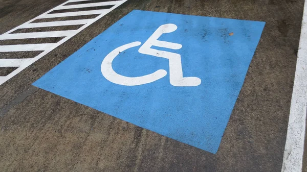 Disabled parking sign on the street