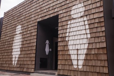 toilet sign and Wooden blocks stacked as wall  clipart