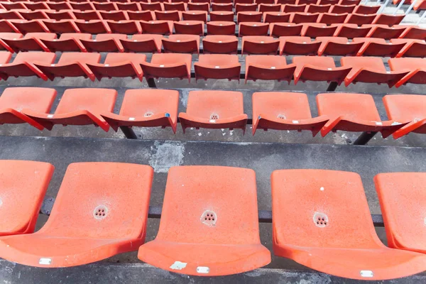 orange seat of football stadium in thailand