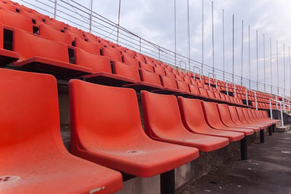 orange seat of football stadium in thailand