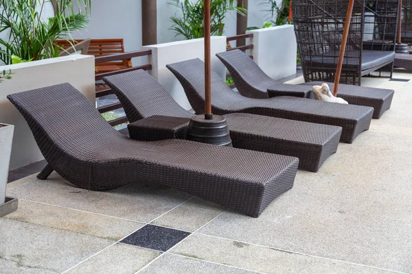 Outdoor swimming pool with modern chair in hotel at Phuket Thailand — 스톡 사진