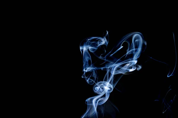 Abstrakt rök av joss stickon svart bakgrund — Stockfoto