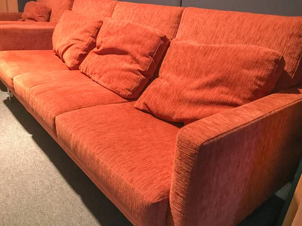 Orange sofa and black wall in living room — Stock Photo, Image